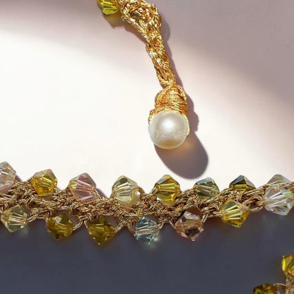 Natural pearl detail on handmade Sicilian crochet necklace with Swarovski crystals