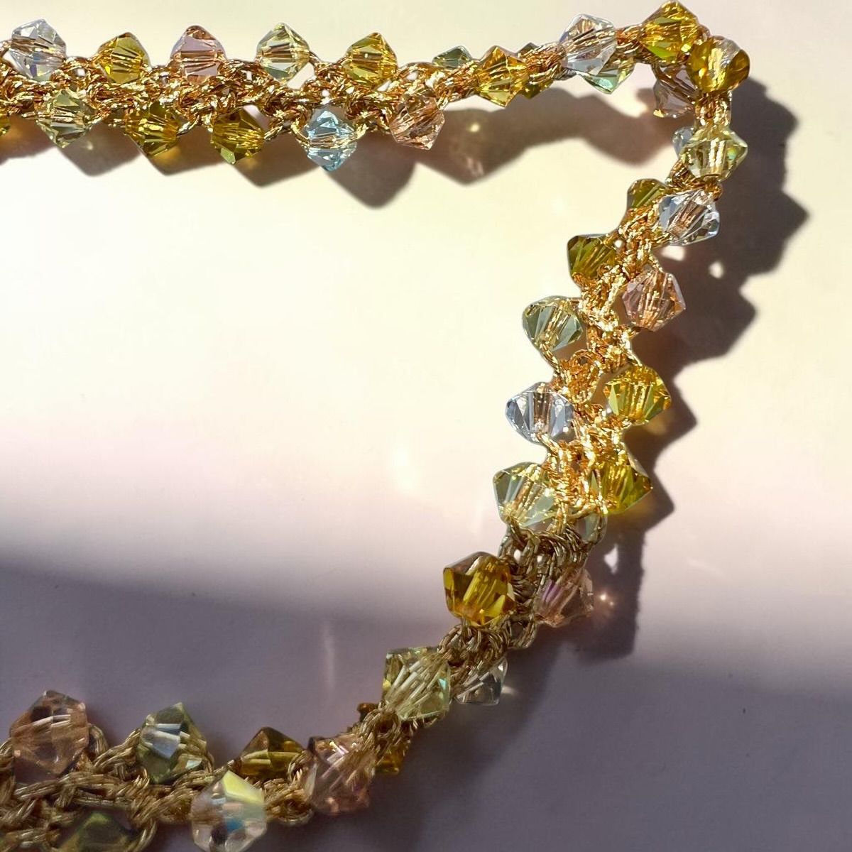 Hand-crocheted Sicilian necklace with Swarovski crystals and gold-tone thread detail