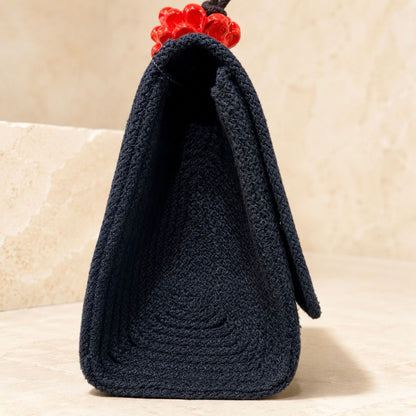 Noir Flame · Bolso de mano de algodón negro con piña de Caltagirone roja
