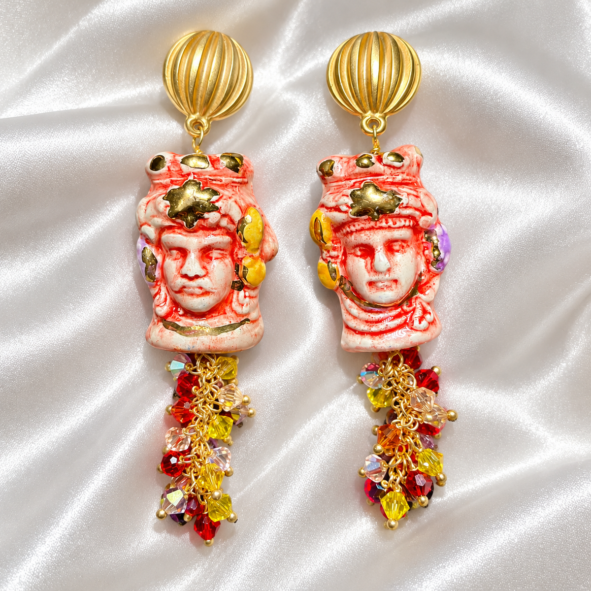 Hand-painted Caltagirone ceramic Moor’s Head earrings in red and white with 10% gold lustre, Swarovski crystals and gold-tone details.