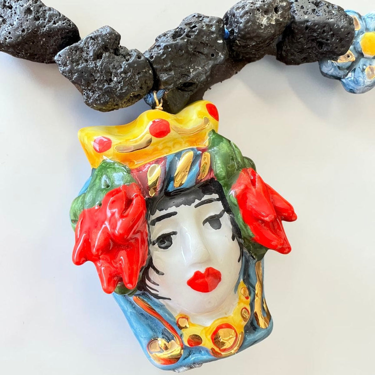 Hand-painted Sicilian Testa di Moro ceramic pendant with Etna lava stone on handmade necklace from Sicily