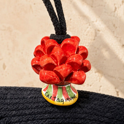 Noir Flame · Bolso de mano de algodón negro con piña de Caltagirone roja