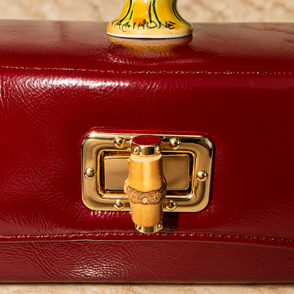 Borgogna Barocca · Caltagirone Ceramic Pine Cone & Nappalak Leather Handbag